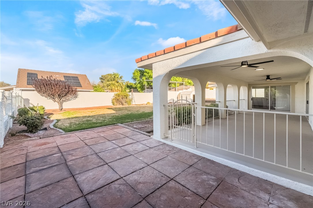 429 Crestway Road Henderson, NV 89015 - Photo 44 of 56 A spacious, tiled patio offers an ideal outdoor living space, complementing the large, private yard.