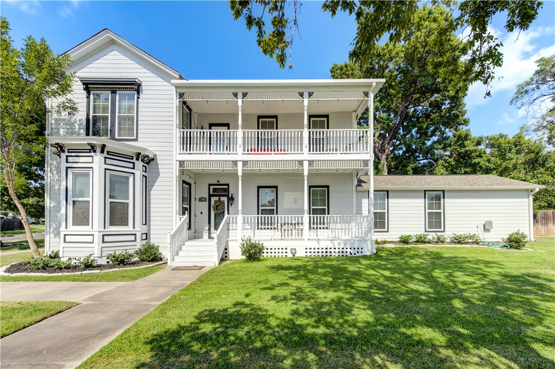 803 South Lasalle Street Navasota, TX 77868 - Photo 1 of 1 Multi unit property featuring a balcony, a porch,