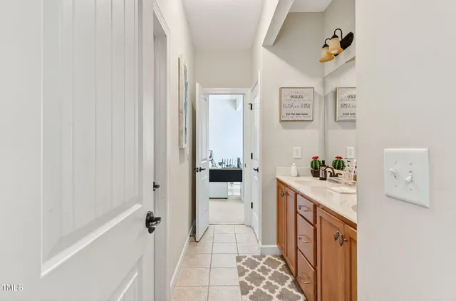 a bathroom with a bathtub sink and toilet