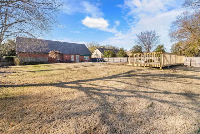 a view of a house with a big yard