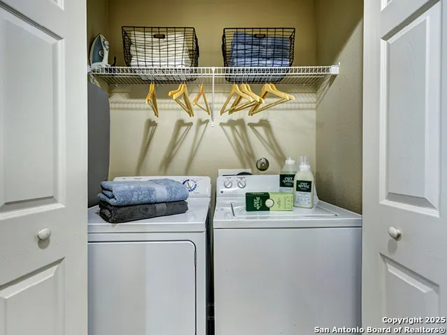 a utility room with dryer and washer