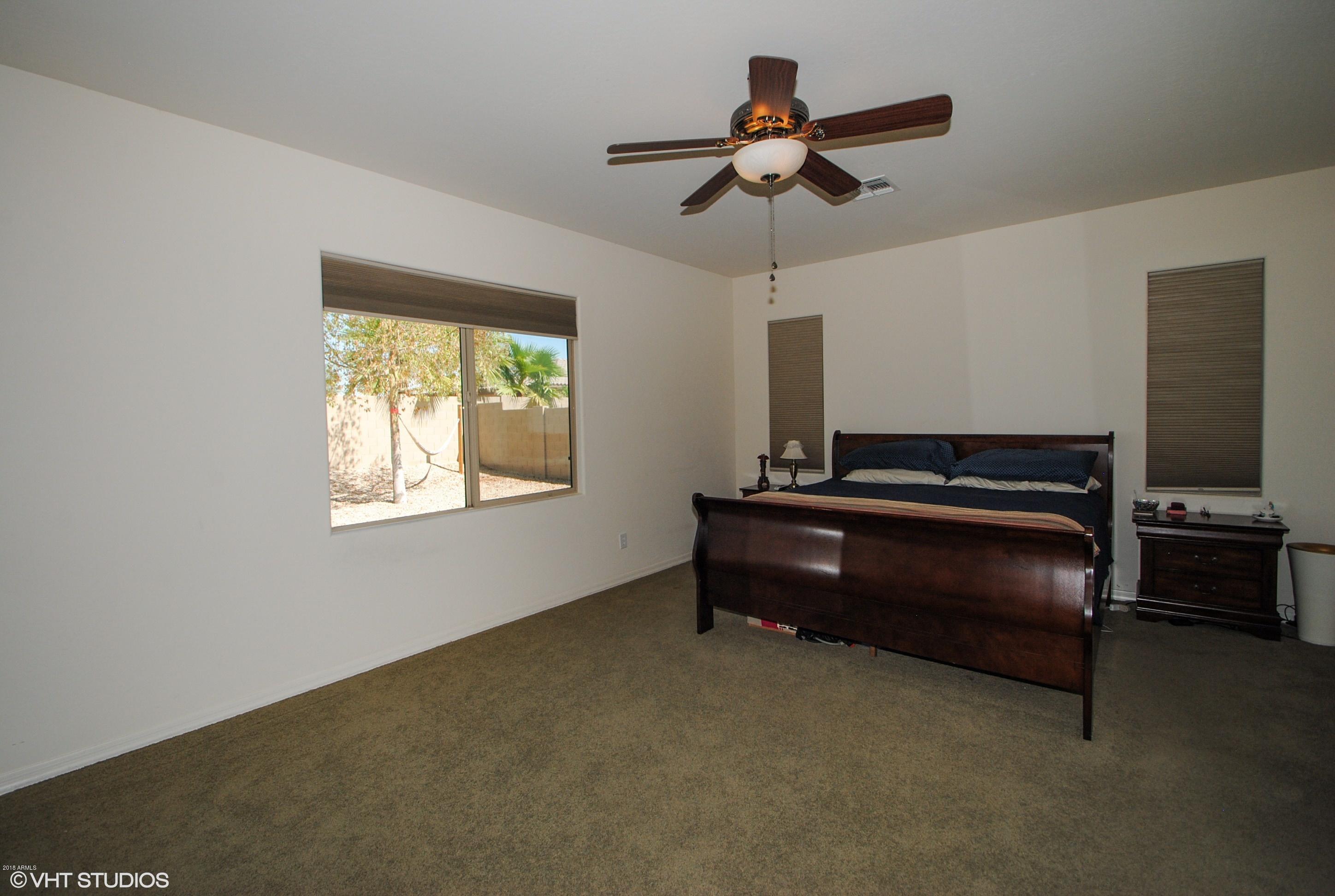 16238 West Granada Road Goodyear, AZ 85395 - Photo 12 of 25 11_16238WGranada_14_MasterBedroom_HiRes