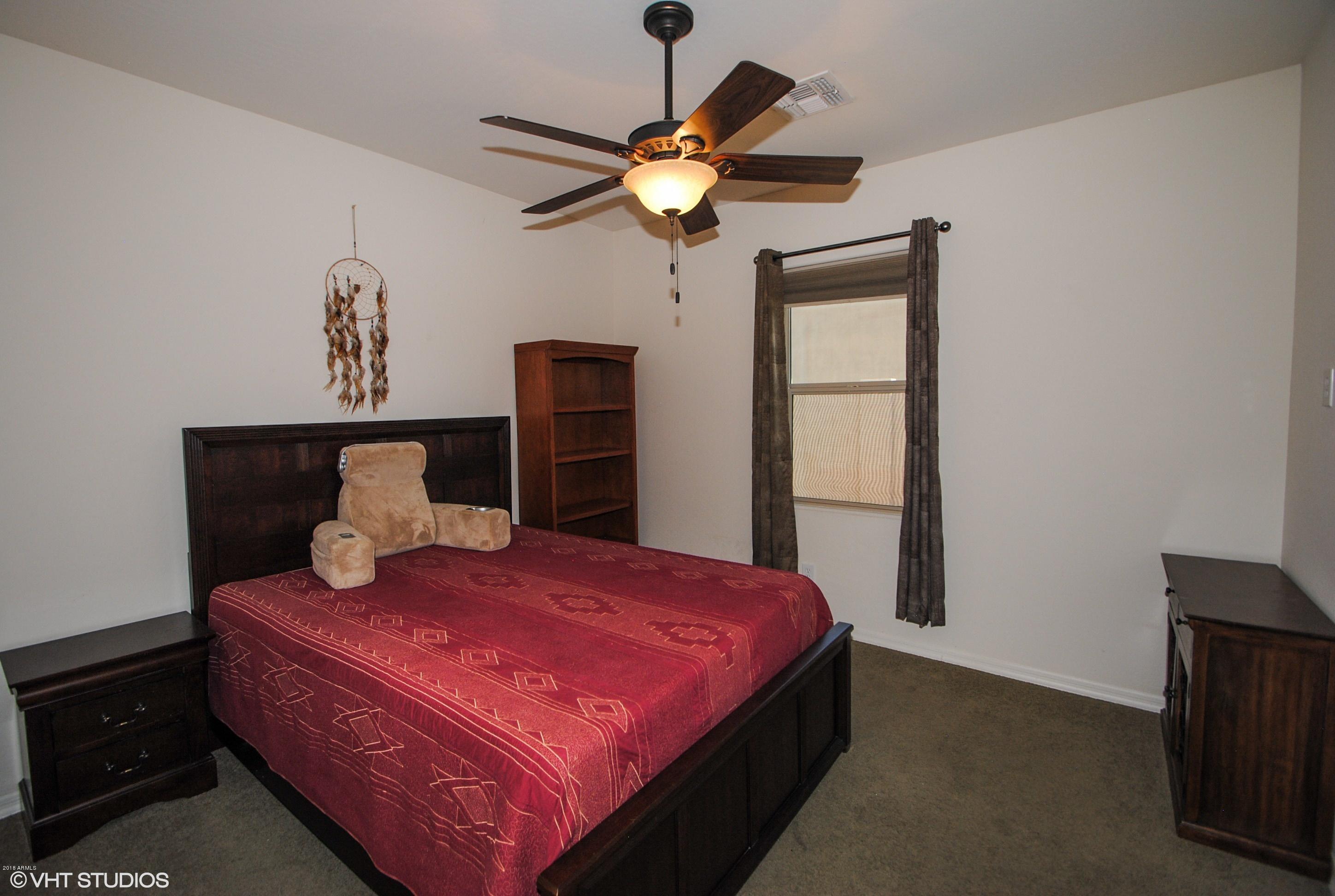 16238 West Granada Road Goodyear, AZ 85395 - Photo 15 of 25 14_16238WGranada_18_Bedroom_HiRes