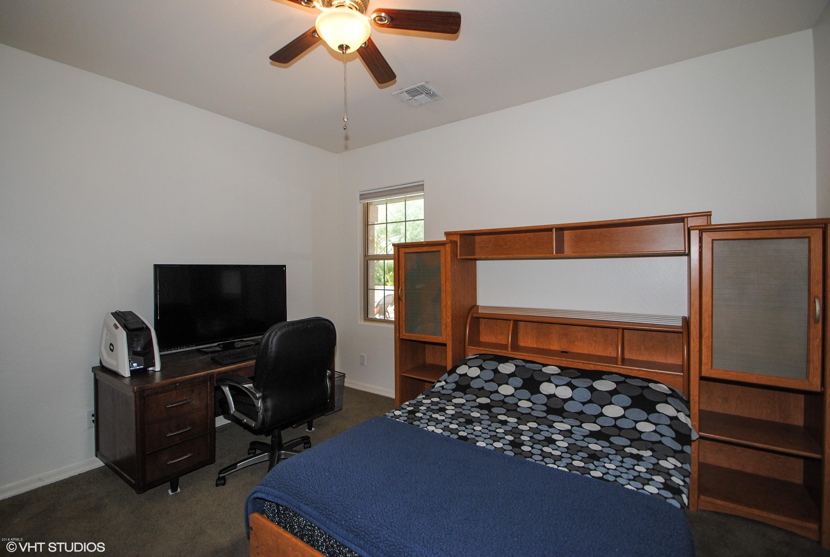 16238 West Granada Road Goodyear, AZ 85395 - Photo 17 of 25 16_16238WGranada_18002_Bedroom_HiRes