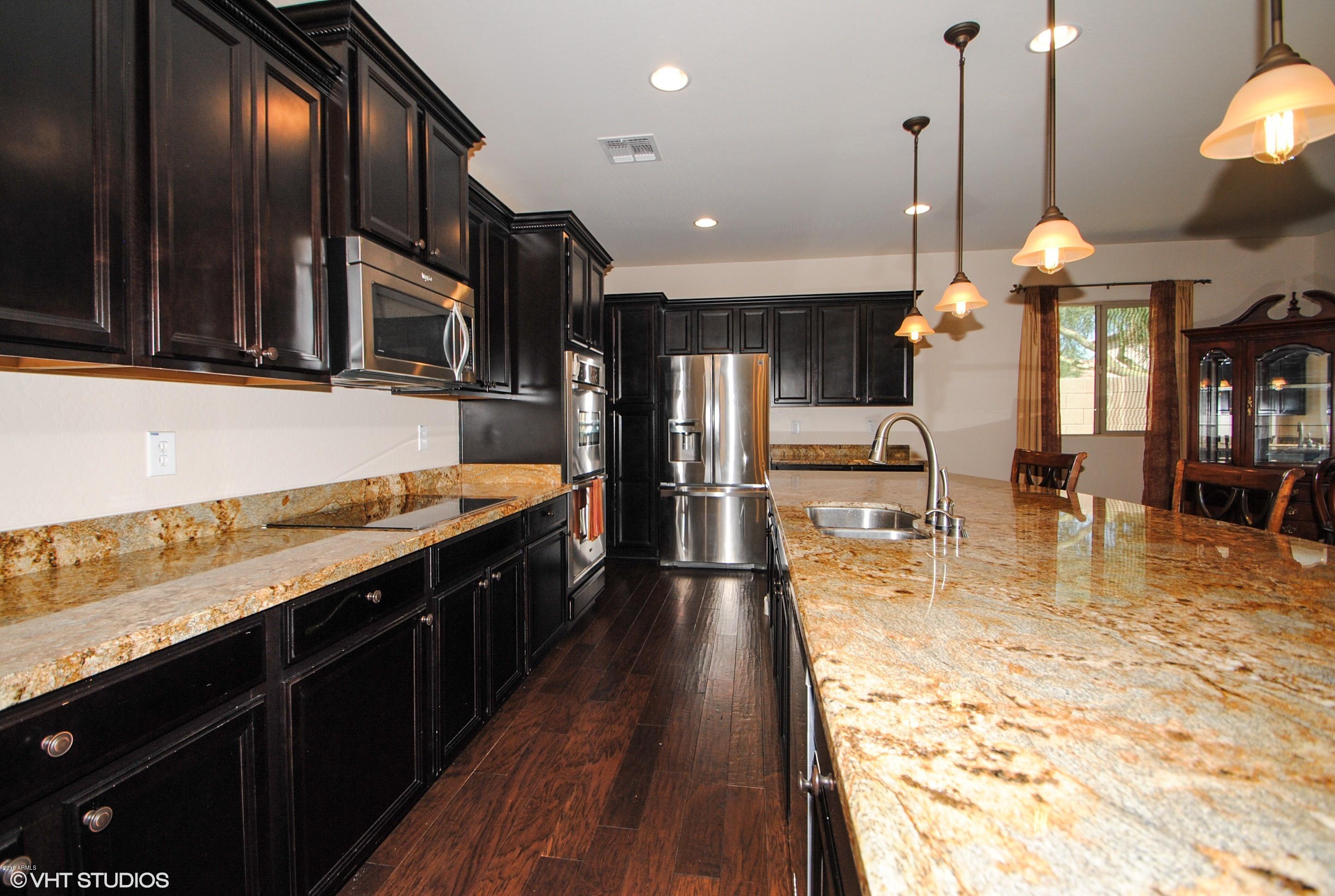 16238 West Granada Road Goodyear, AZ 85395 - Photo 9 of 25 08_16238WGranada_177003_Kitchen_HiRes