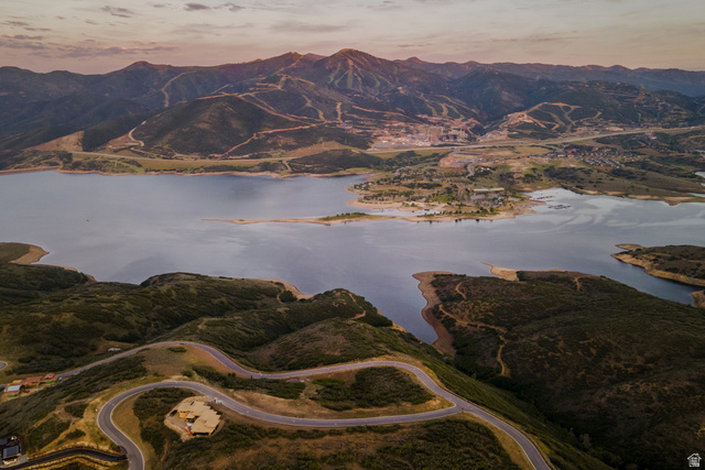 9269 North Sunset Road Kamas, UT 84036 - Photo 13 of 21 Sweeping aerial perspective encompassing a large body of water, distant mountains, and a winding road