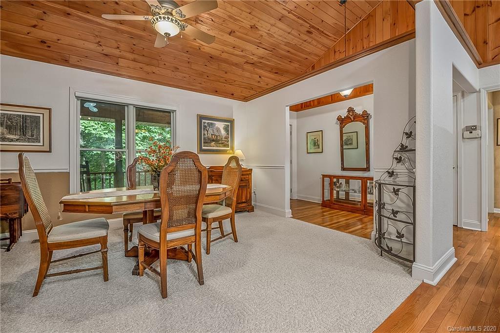215 Beechtree Circle Rutherfordton, NC 28139 - Photo 11 of 42 a dining room with furniture and a floor to ceiling window
