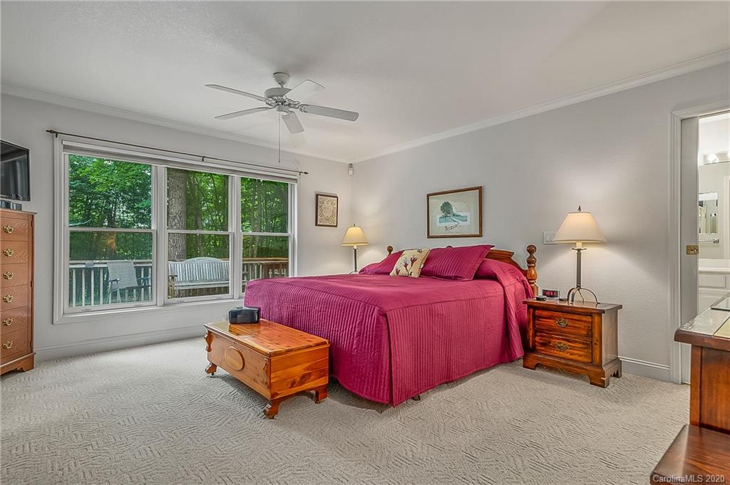 215 Beechtree Circle Rutherfordton, NC 28139 - Photo 19 of 42 a spacious bedroom with a bed and a large window