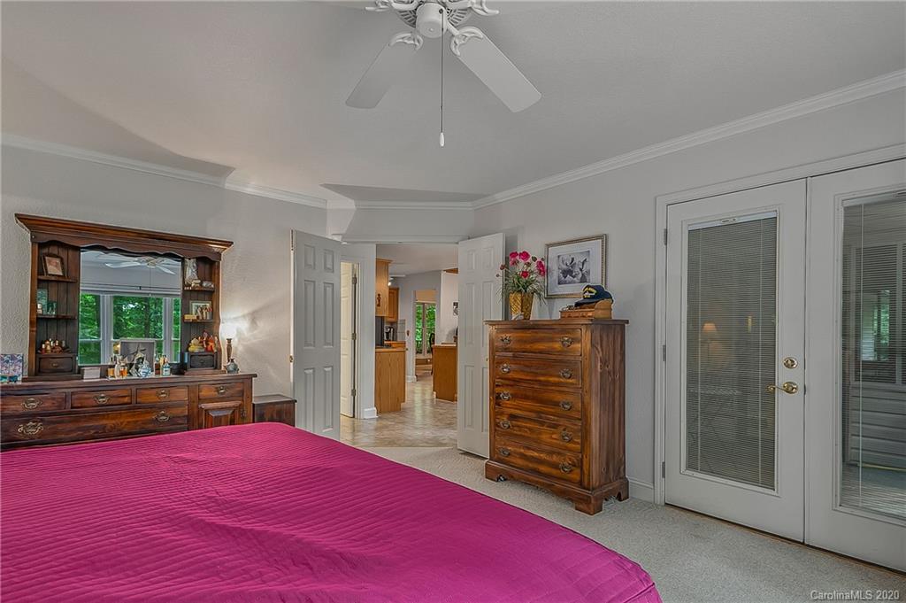 215 Beechtree Circle Rutherfordton, NC 28139 - Photo 20 of 42 a bedroom with a bed and a dresser