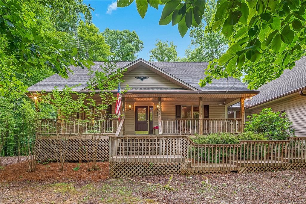 215 Beechtree Circle Rutherfordton, NC 28139 - Photo 3 of 42 a front view of a house with a garden