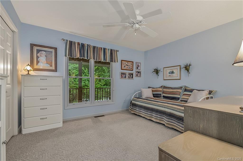 215 Beechtree Circle Rutherfordton, NC 28139 - Photo 26 of 42 a spacious bedroom with a bed and a window