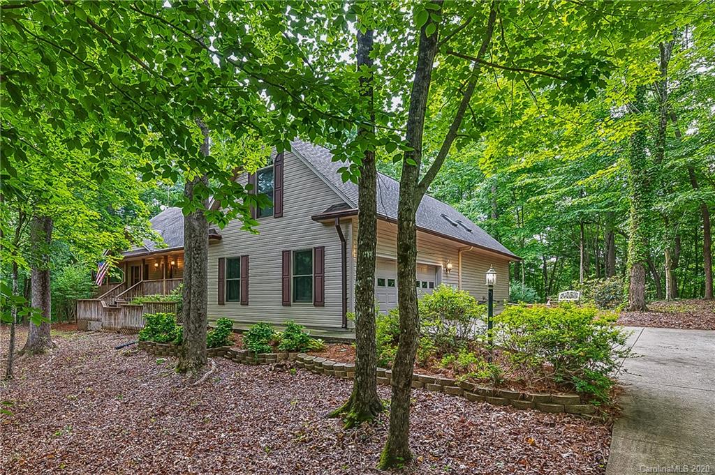 215 Beechtree Circle Rutherfordton, NC 28139 - Photo 34 of 42 a front view of a house with garden