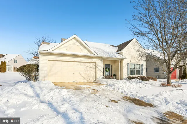a view of livingroom with hardwood floor and hallway