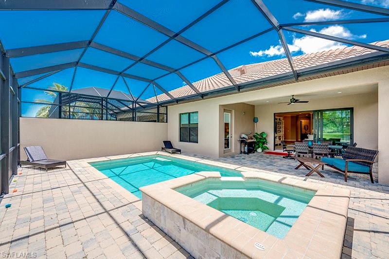 6564 Roma Way Naples, FL 34113 - Photo 18 of 22 a view of outdoor space with seating area