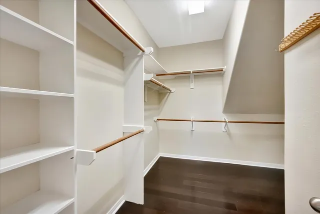 a view of an empty walk in closet
