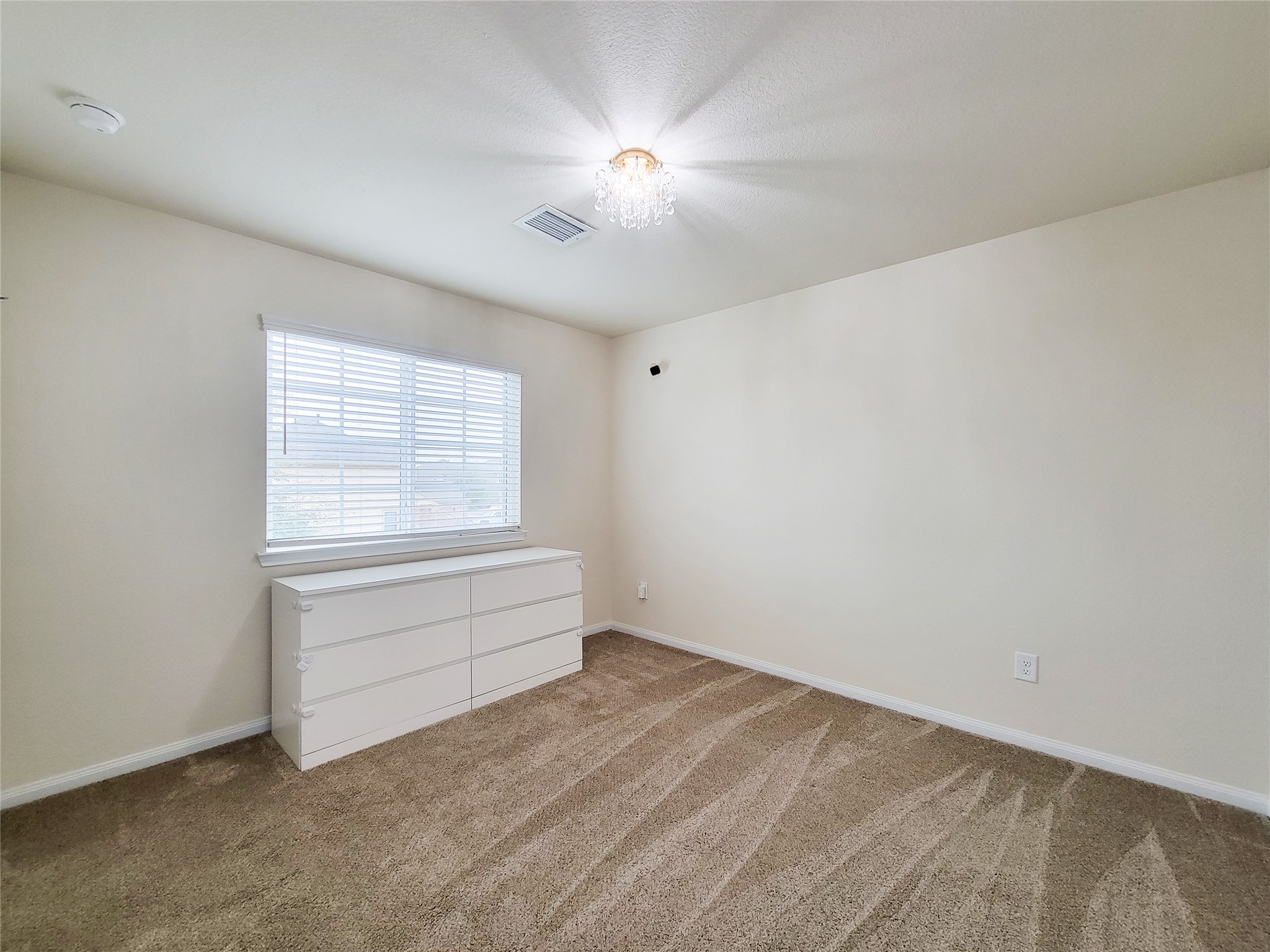 13111 Italian Cypress Trail Houston, TX 77044 - Photo 12 of 17 a view of an empty room with a window
