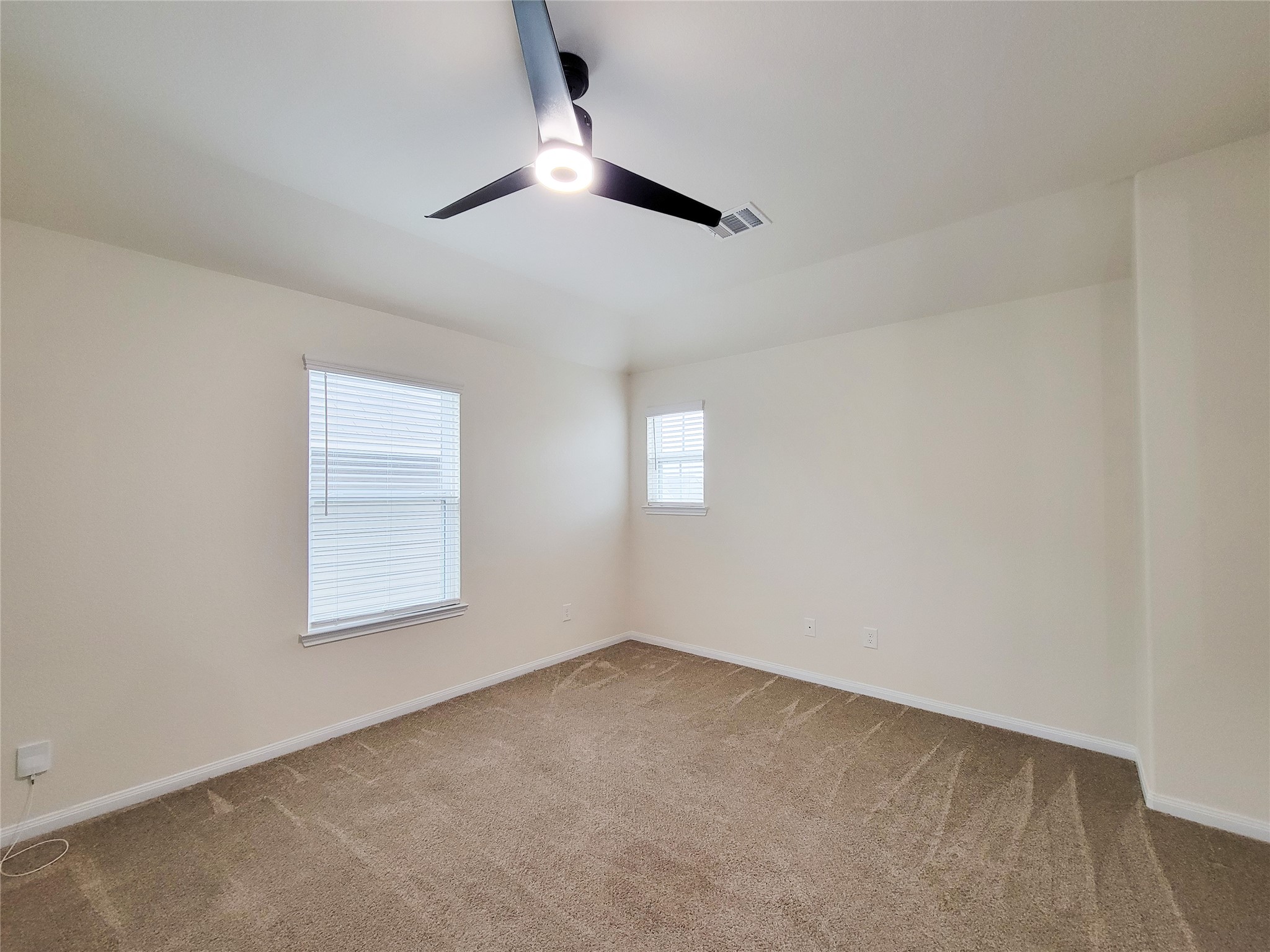 13111 Italian Cypress Trail Houston, TX 77044 - Photo 15 of 17 an empty room with a window