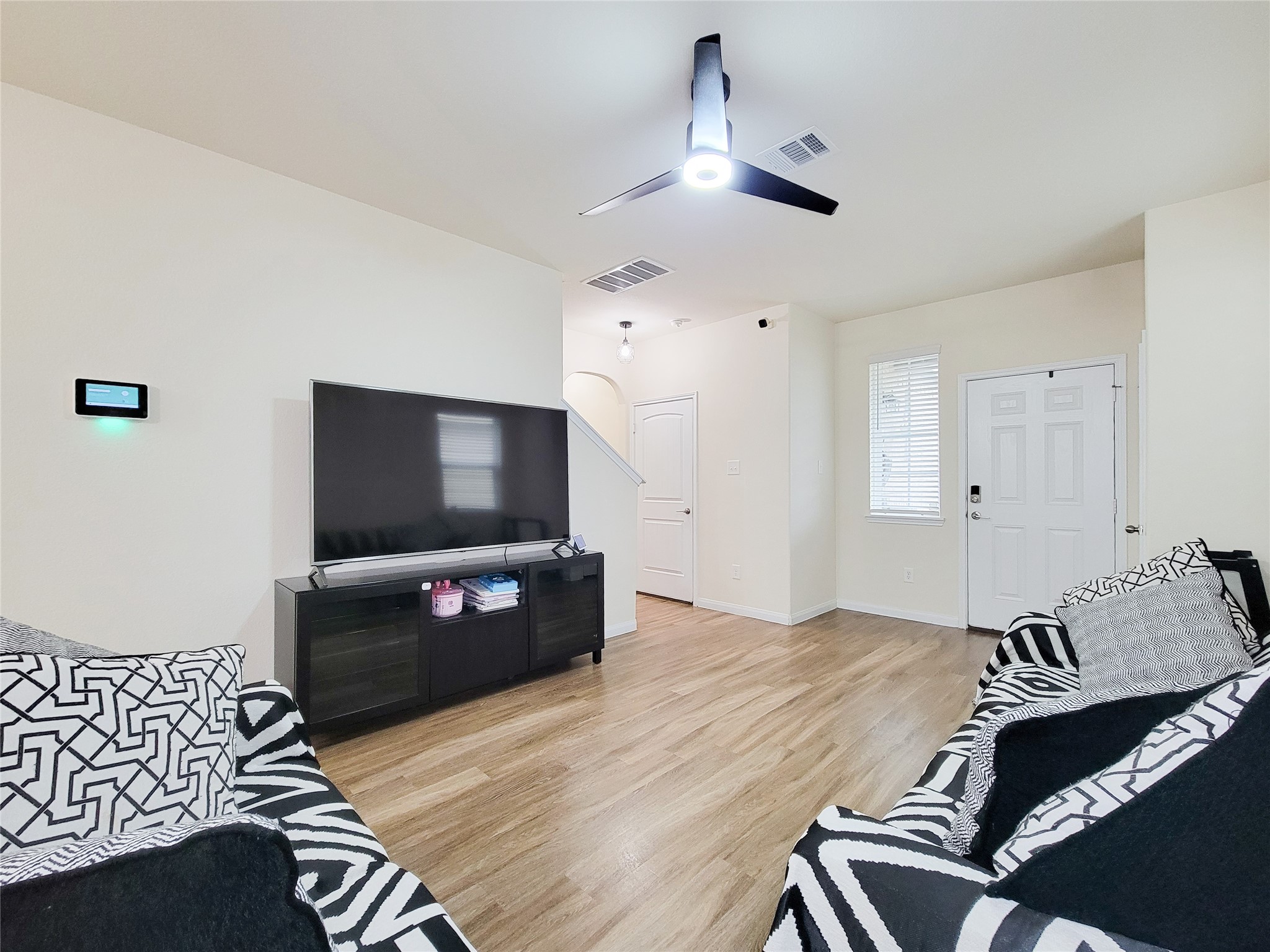 13111 Italian Cypress Trail Houston, TX 77044 - Photo 8 of 17 a living room with furniture and a flat screen tv
