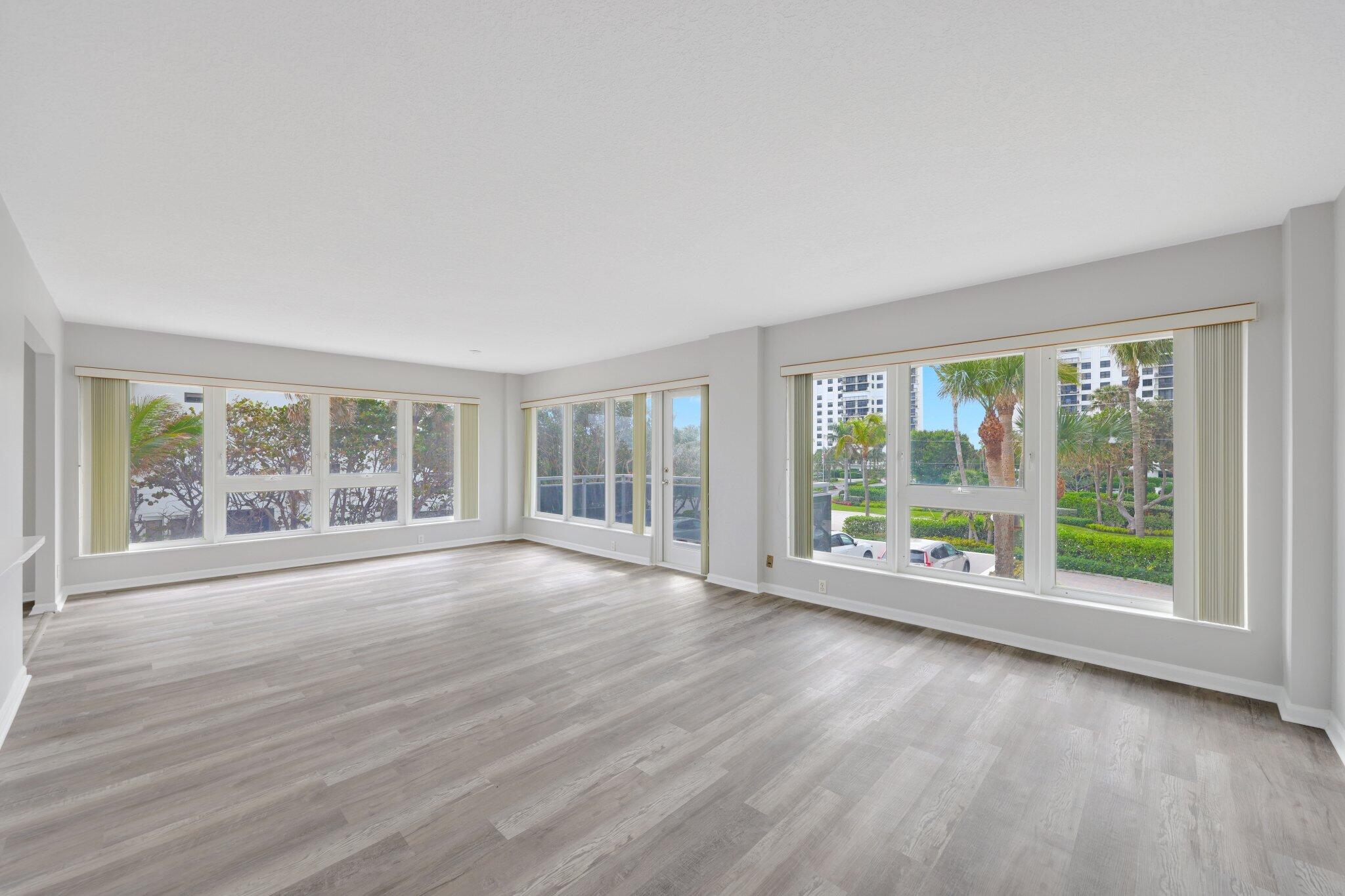 2066 North Ocean Boulevard, Unit 2SW Boca Raton, FL 33431 - Photo 3 of 34 Living/Dining Area w/ Balcony