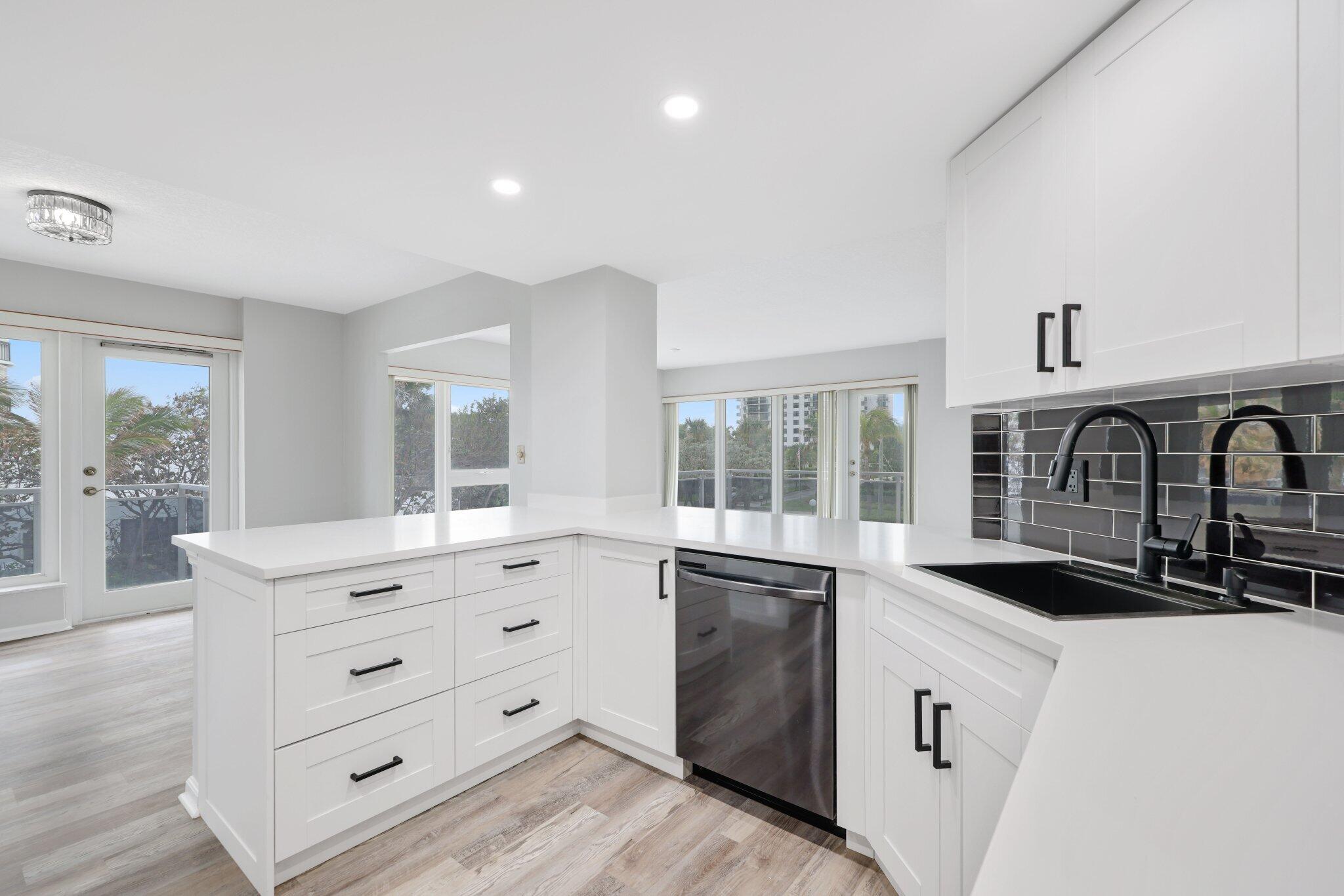 2066 North Ocean Boulevard, Unit 2SW Boca Raton, FL 33431 - Photo 8 of 34 Kitchen Open to Living Room