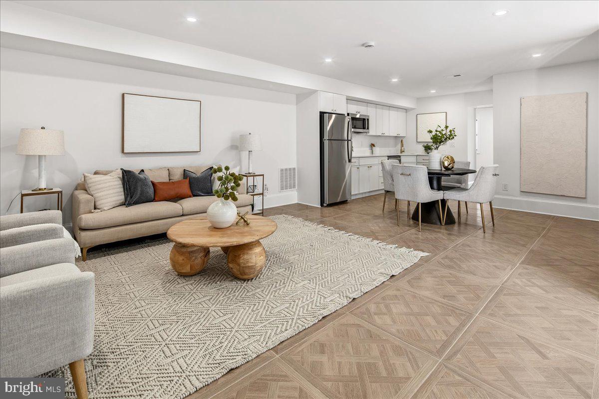 21 Channing Street Northeast Washington, DC 20002 - Photo 28 of 48 a living room with furniture and view of kitchen