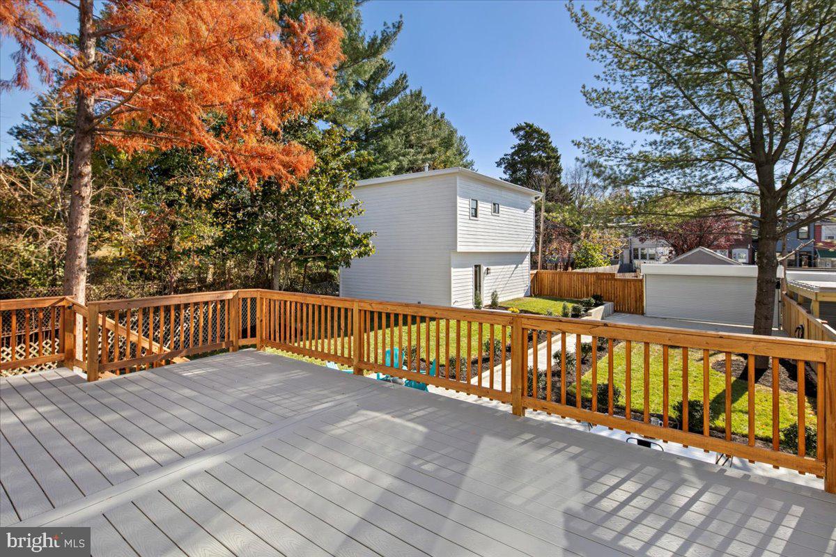 21 Channing Street Northeast Washington, DC 20002 - Photo 33 of 48 a view of balcony with wooden floor and fence