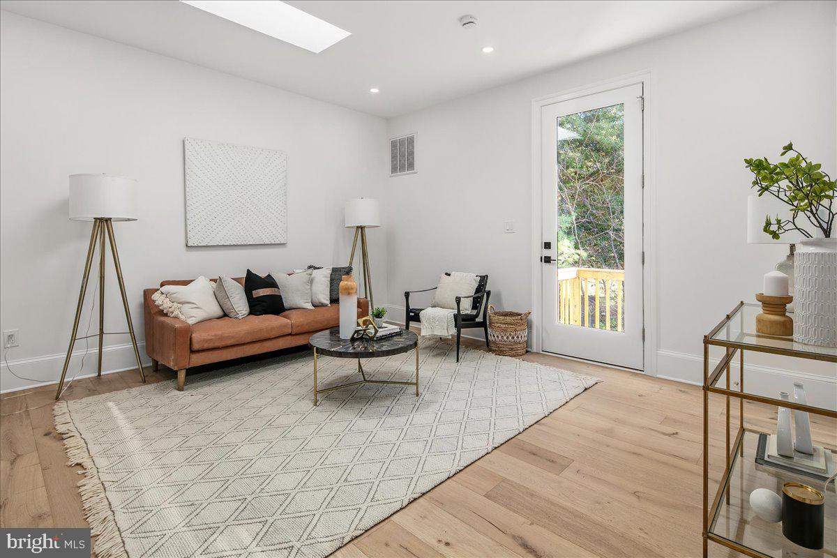 21 Channing Street Northeast Washington, DC 20002 - Photo 35 of 48 a living room with furniture and a window