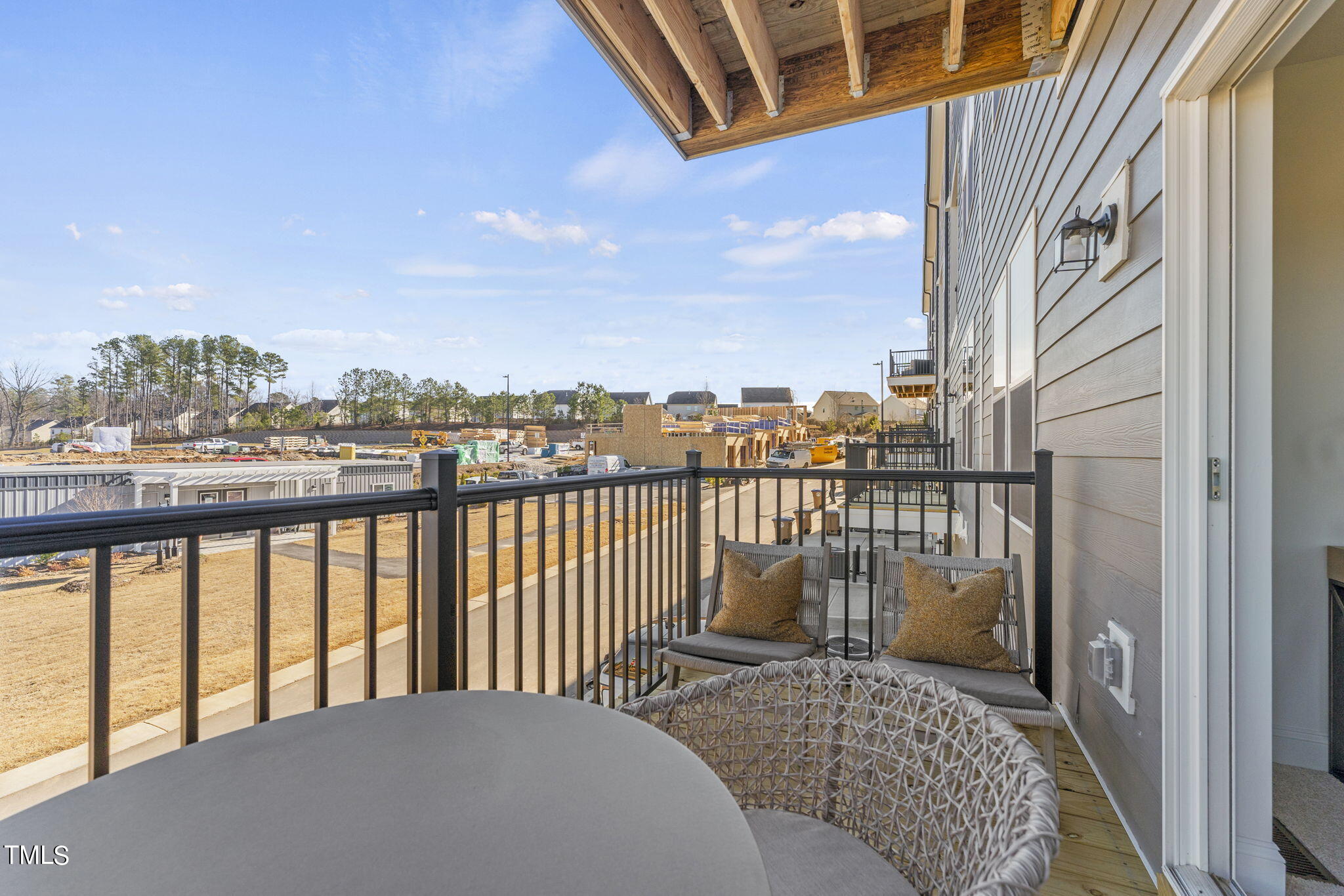 1206 Coach Station Alley, Unit 101 Raleigh, NC 27601 - Photo 19 of 48 a balcony view with a lake view