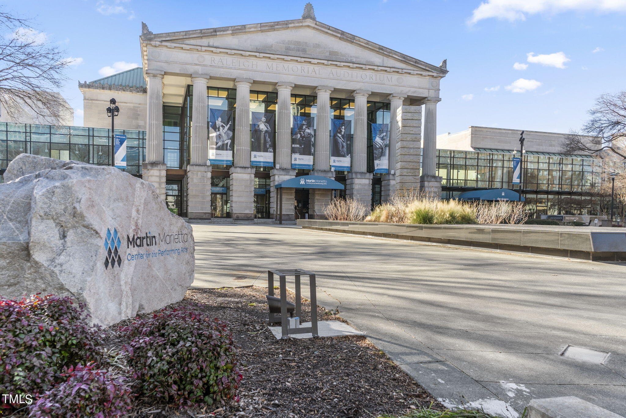 1206 Coach Station Alley, Unit 101 Raleigh, NC 27601 - Photo 36 of 48 a view of a house with a fountain in a yard