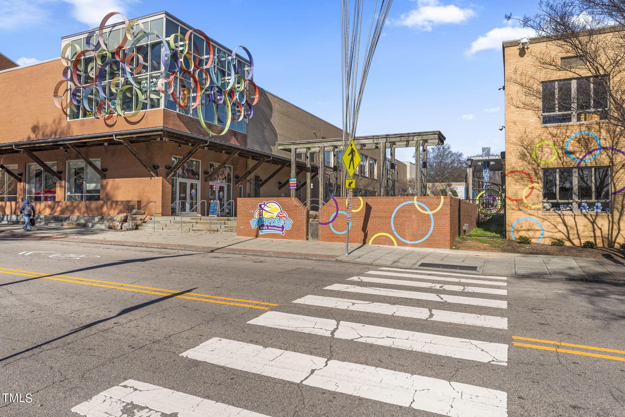 1206 Coach Station Alley, Unit 101 Raleigh, NC 27601 - Photo 41 of 48 a view of a building with a street light