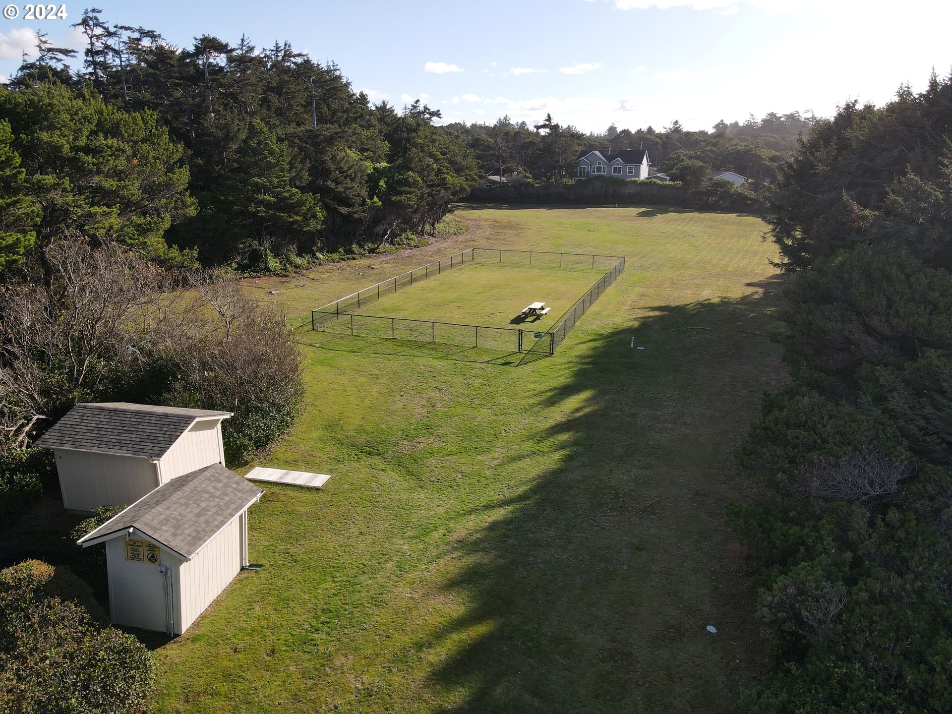 0 Shoreline Drive, Unit 121 Florence, OR 97439 - Photo 17 of 22 a view of a house with a yard