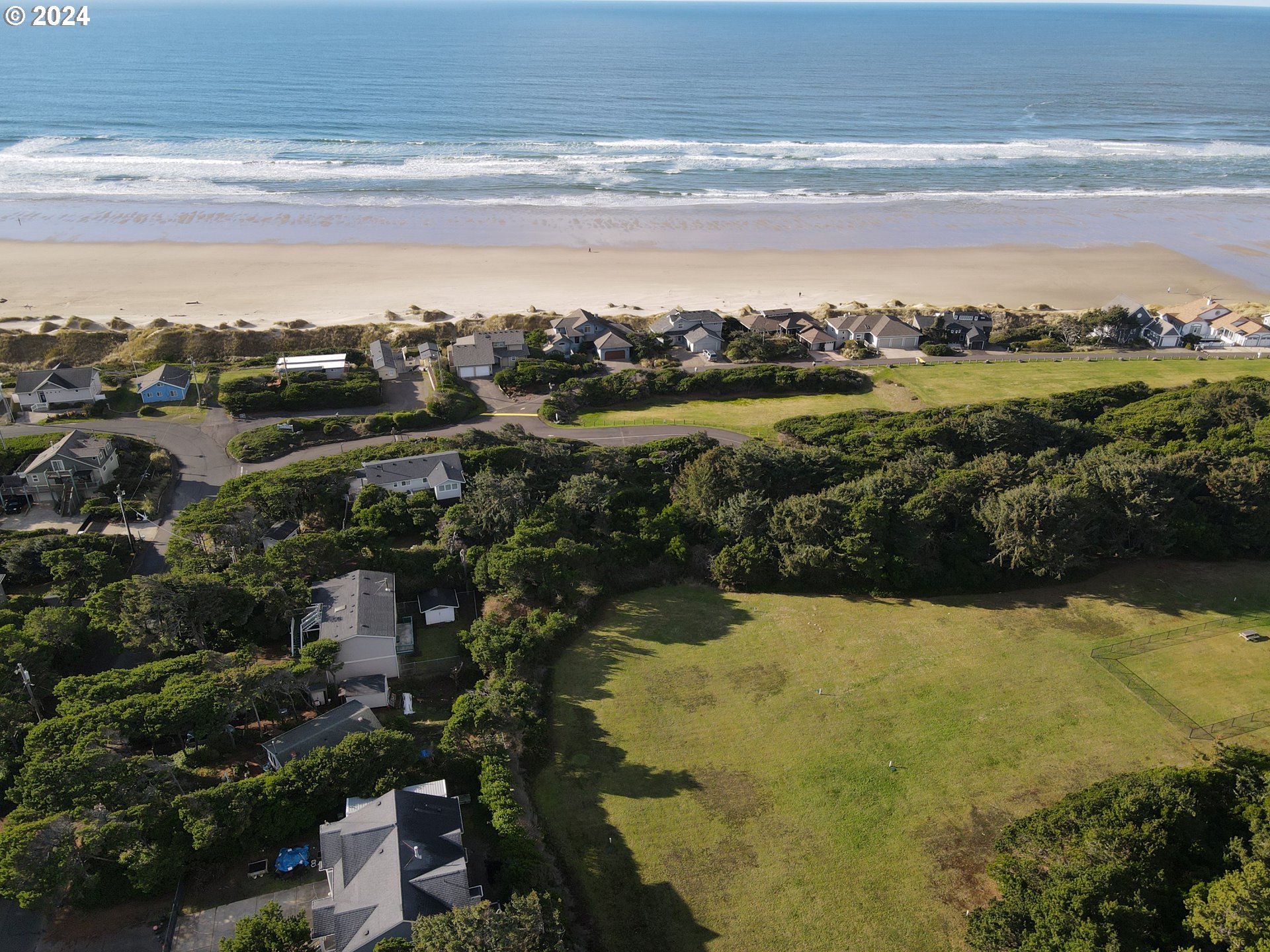 0 Shoreline Drive, Unit 121 Florence, OR 97439 - Photo 20 of 22 a view of lake with city