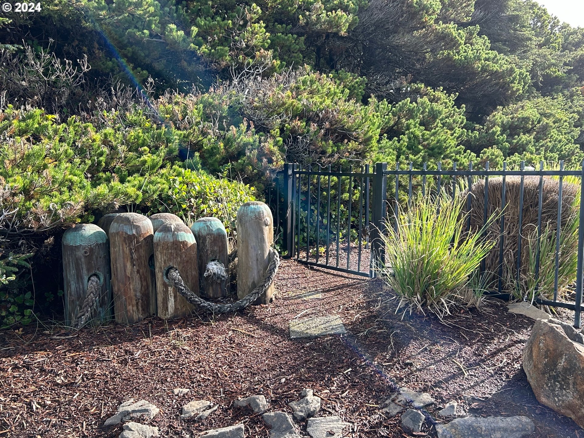 0 Shoreline Drive, Unit 121 Florence, OR 97439 - Photo 5 of 22 a view of a backyard