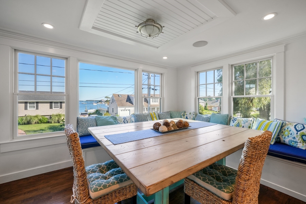 29 Bay Shore Road Hyannis, MA 02601 - Photo 11 of 42 a view of a dining room with furniture window and wooden floor
