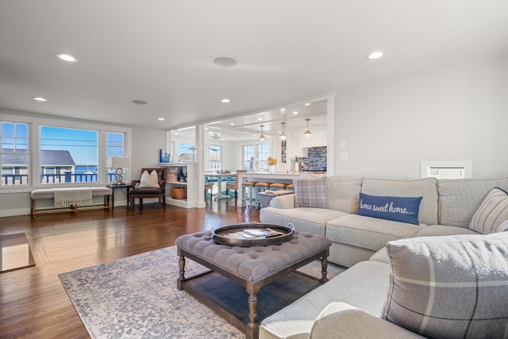 29 Bay Shore Road Hyannis, MA 02601 - Photo 13 of 42 a living room with furniture and a table