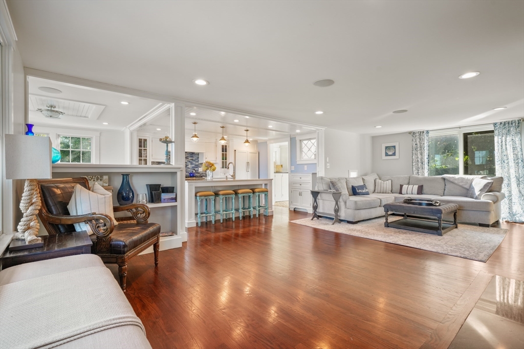 29 Bay Shore Road Hyannis, MA 02601 - Photo 14 of 42 a living room with furniture and a table