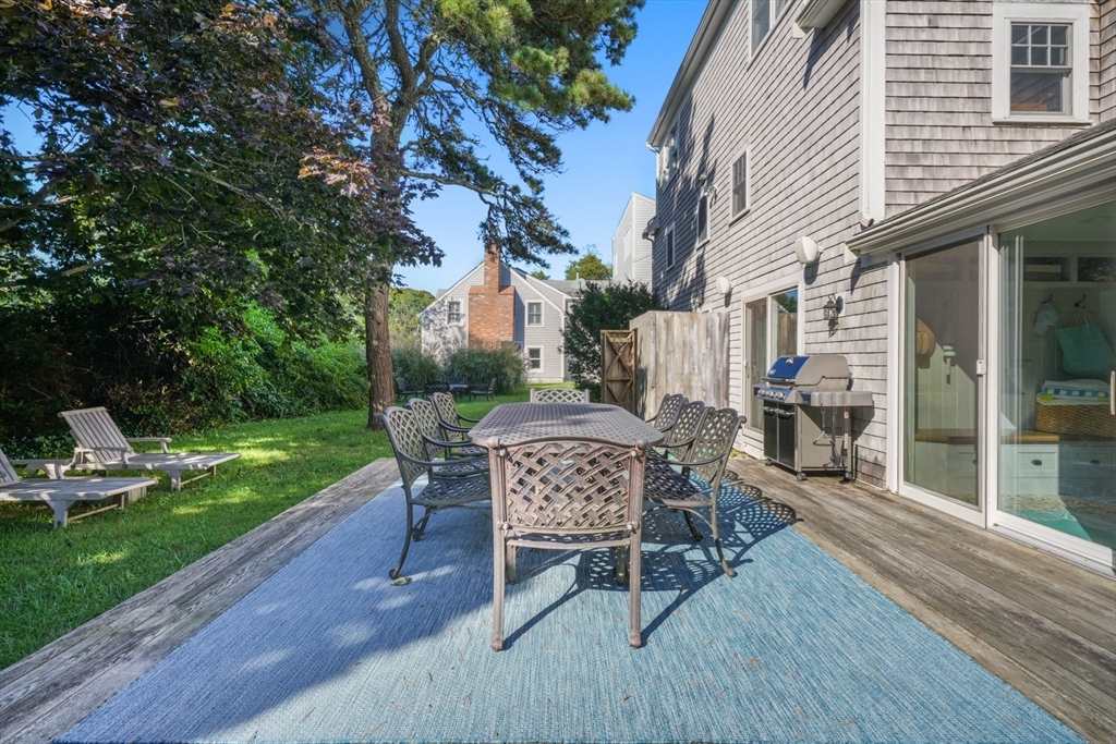 29 Bay Shore Road Hyannis, MA 02601 - Photo 41 of 42 a view of backyard with outdoor seating and green space
