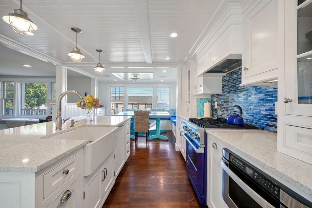 29 Bay Shore Road Hyannis, MA 02601 - Photo 9 of 42 a large kitchen with stainless steel appliances lots of counter space and window
