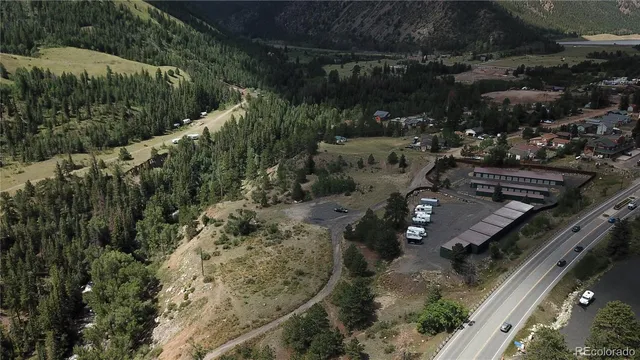 a view of a street with a building in the background