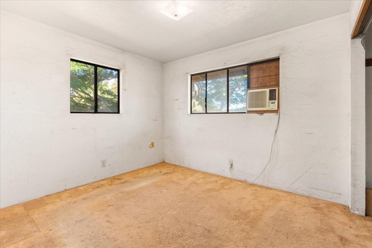 2040 Kanakanui Road Kihei, HI 96753 - Photo 12 of 22 an empty room with windows