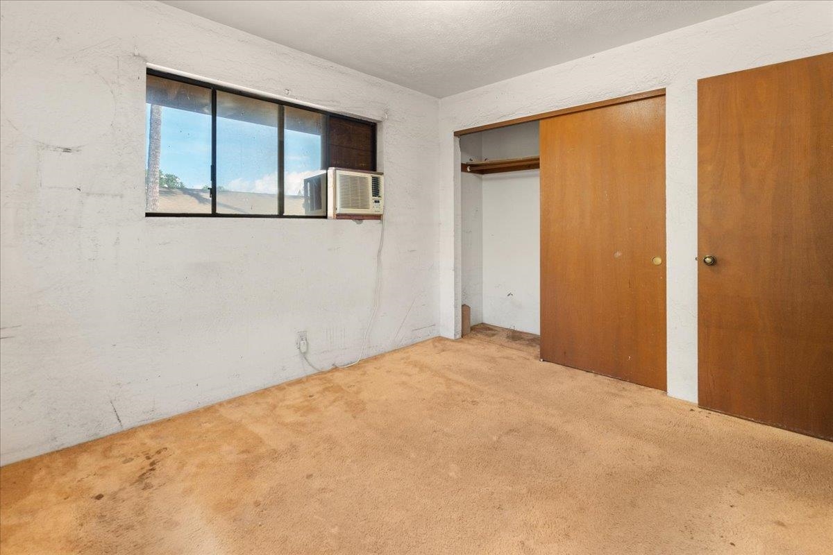 2040 Kanakanui Road Kihei, HI 96753 - Photo 13 of 22 a view of an empty room with windows