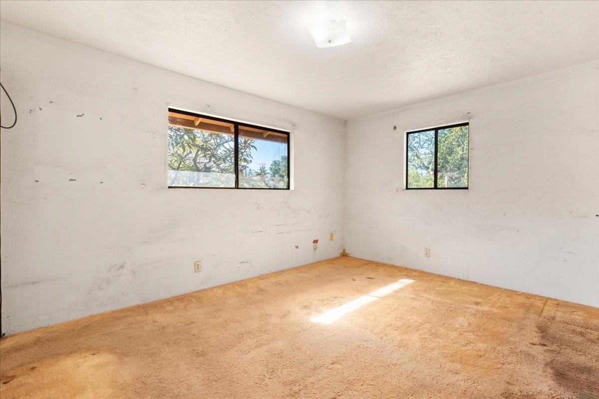 2040 Kanakanui Road Kihei, HI 96753 - Photo 14 of 22 an empty room with windows