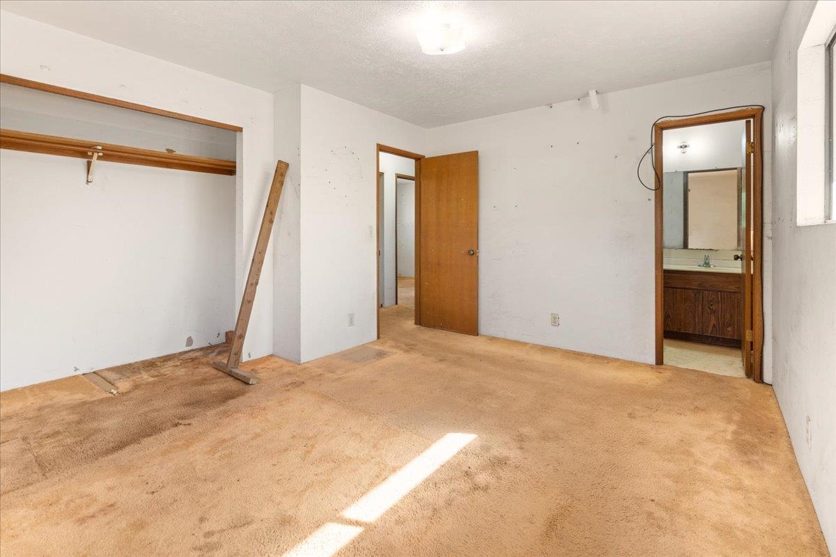 2040 Kanakanui Road Kihei, HI 96753 - Photo 15 of 22 a view of a big room with closet and windows