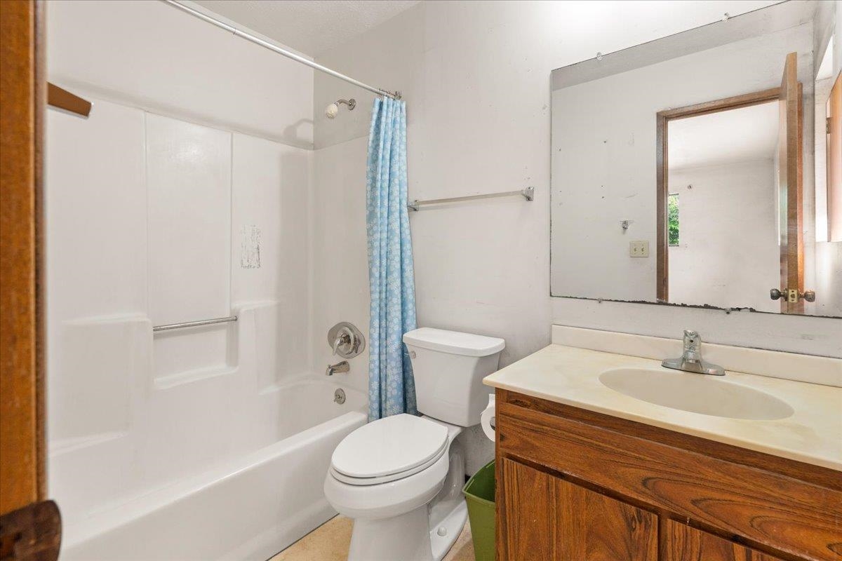 2040 Kanakanui Road Kihei, HI 96753 - Photo 16 of 22 a bathroom with a sink toilet and shower