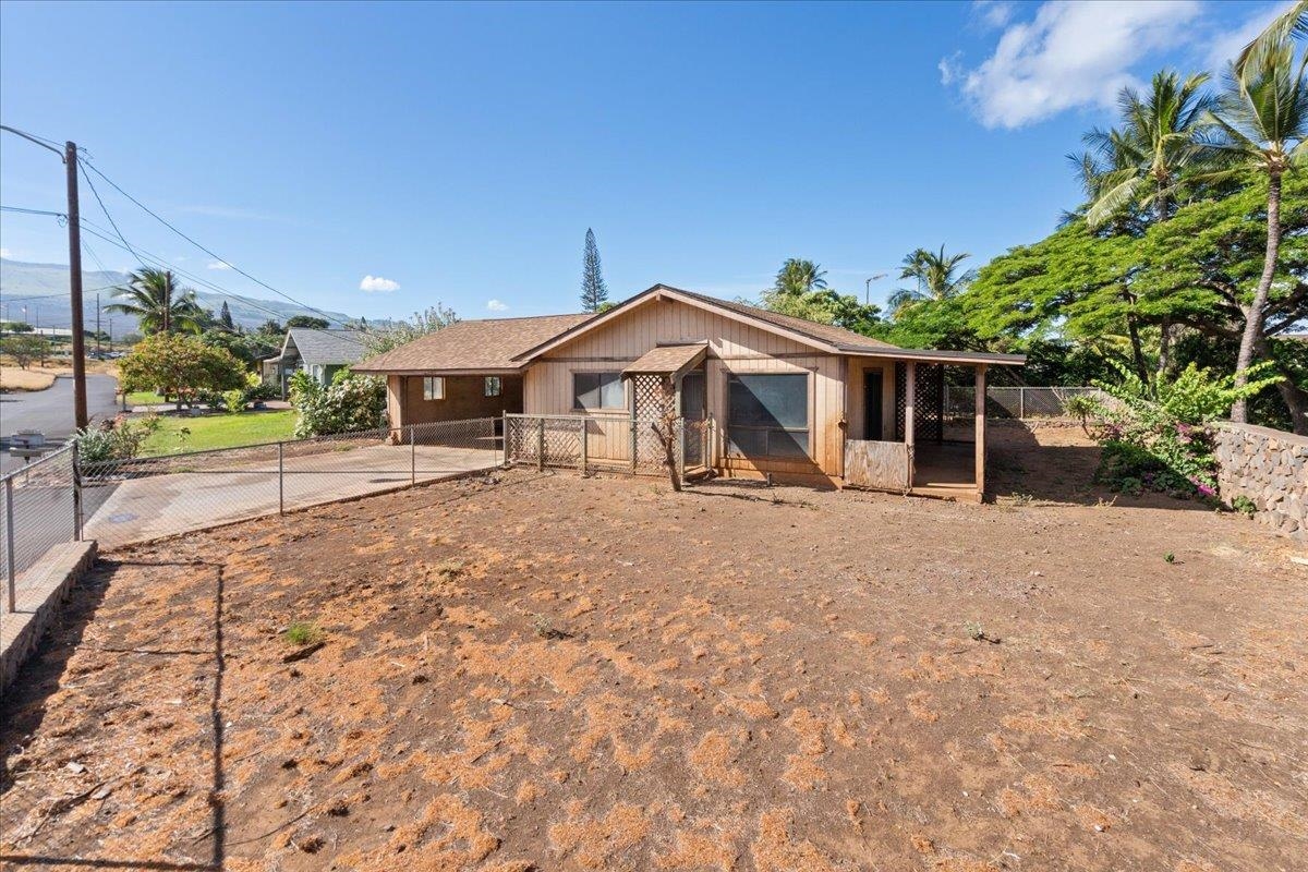 2040 Kanakanui Road Kihei, HI 96753 - Photo 17 of 22 a view of a house with a yard