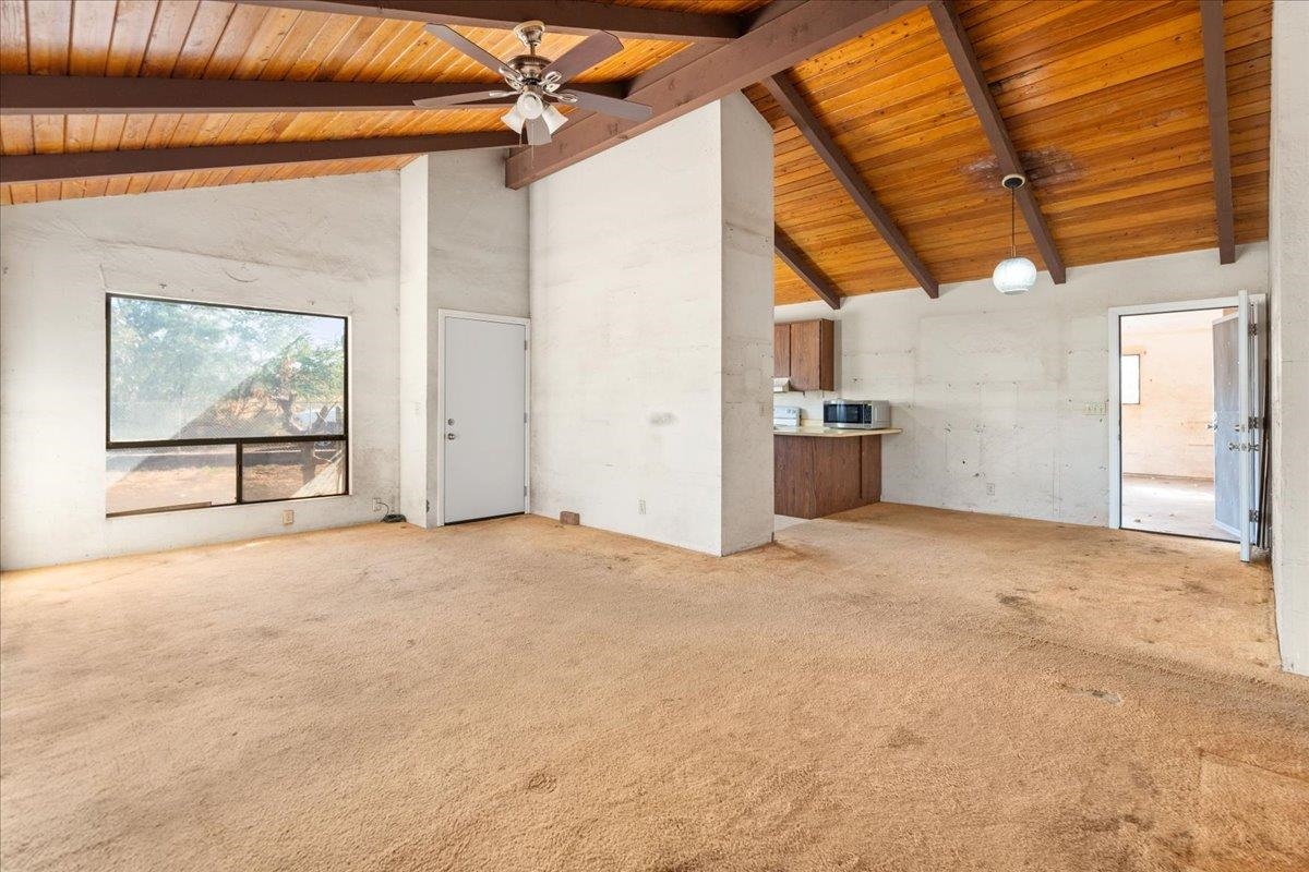 2040 Kanakanui Road Kihei, HI 96753 - Photo 7 of 22 a view of empty room with wooden floor and fan