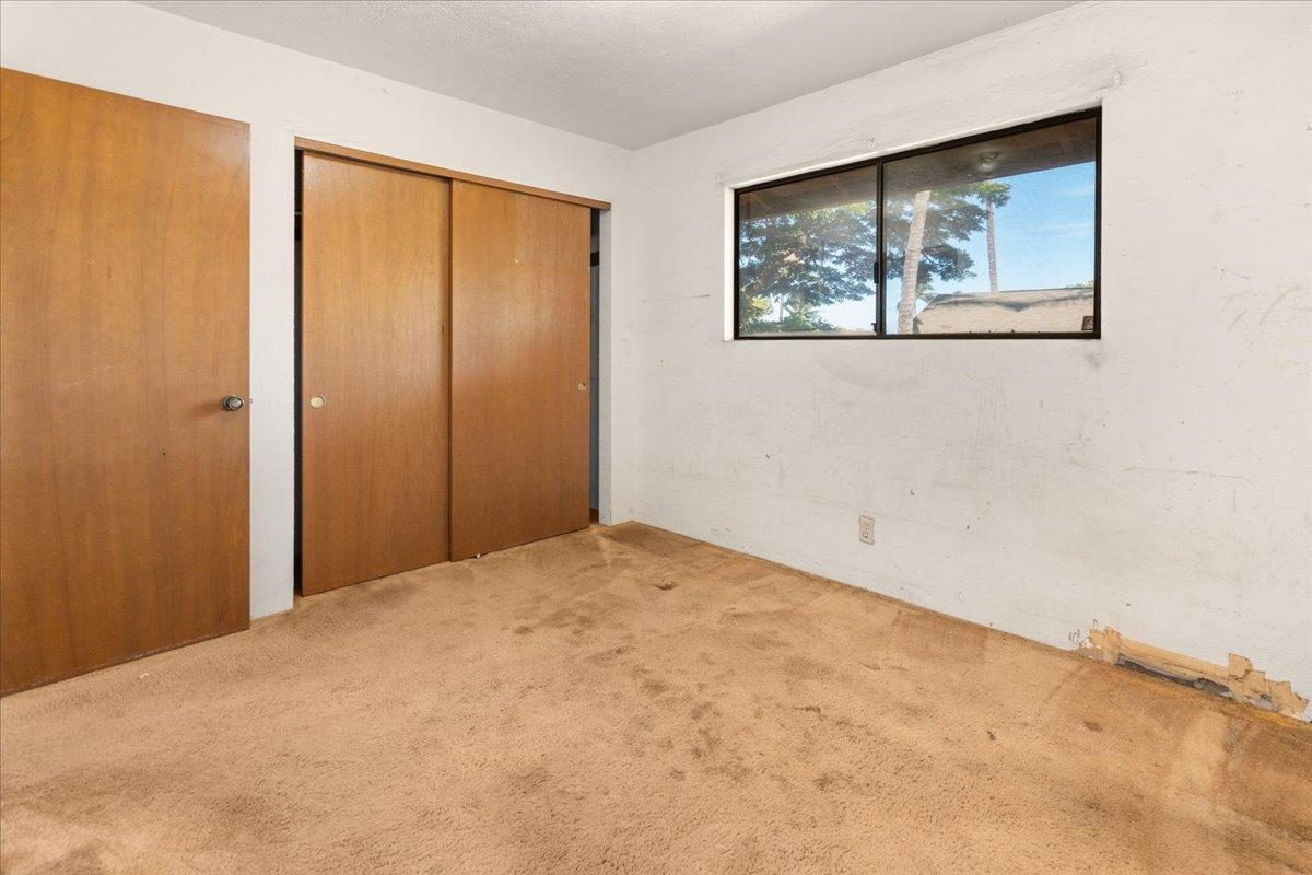 2040 Kanakanui Road Kihei, HI 96753 - Photo 9 of 22 a view of an empty room with a window