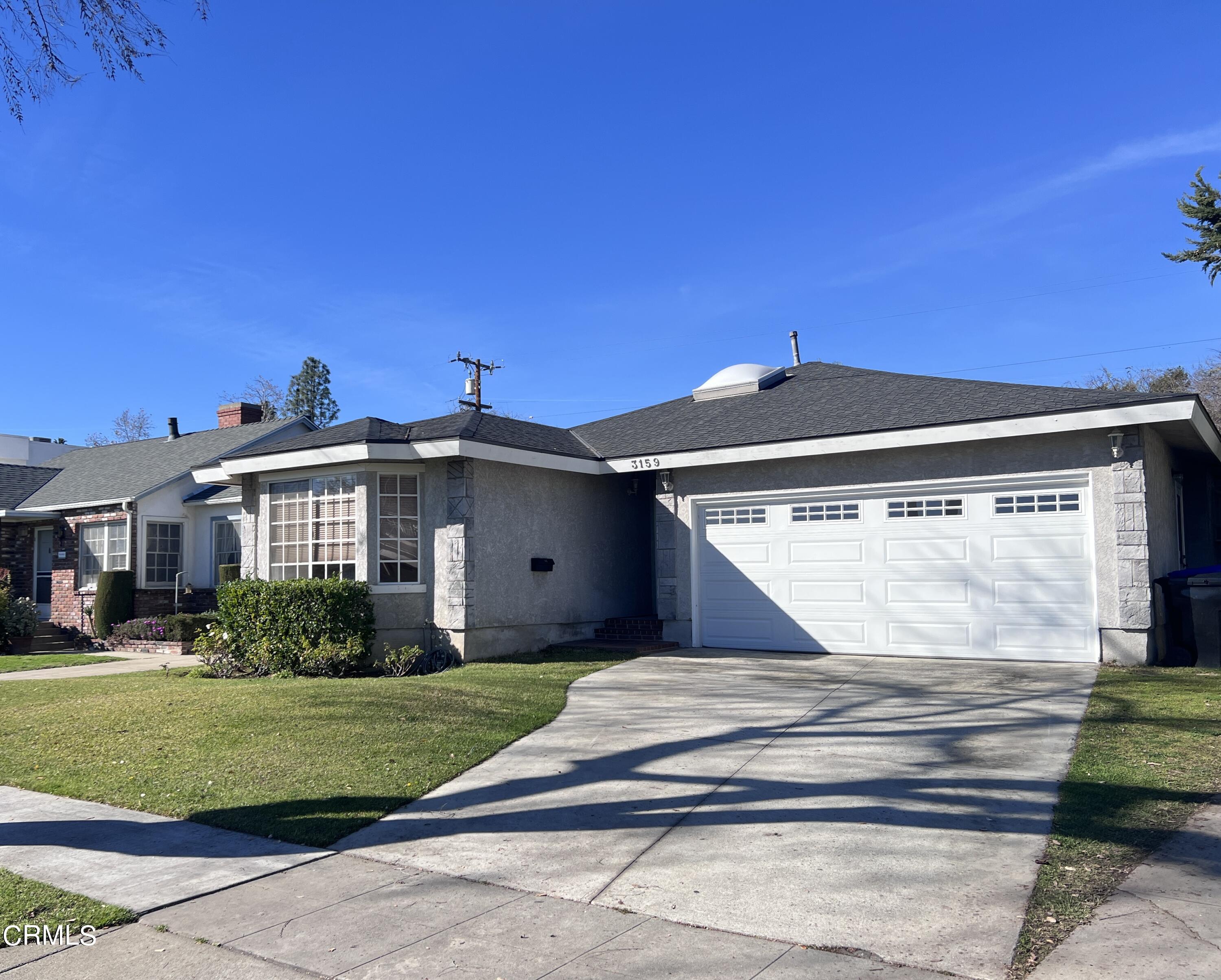 3159 Piccolo Street Pasadena, CA 91107 - Photo 1 of 14 a front view of a house with a yard
