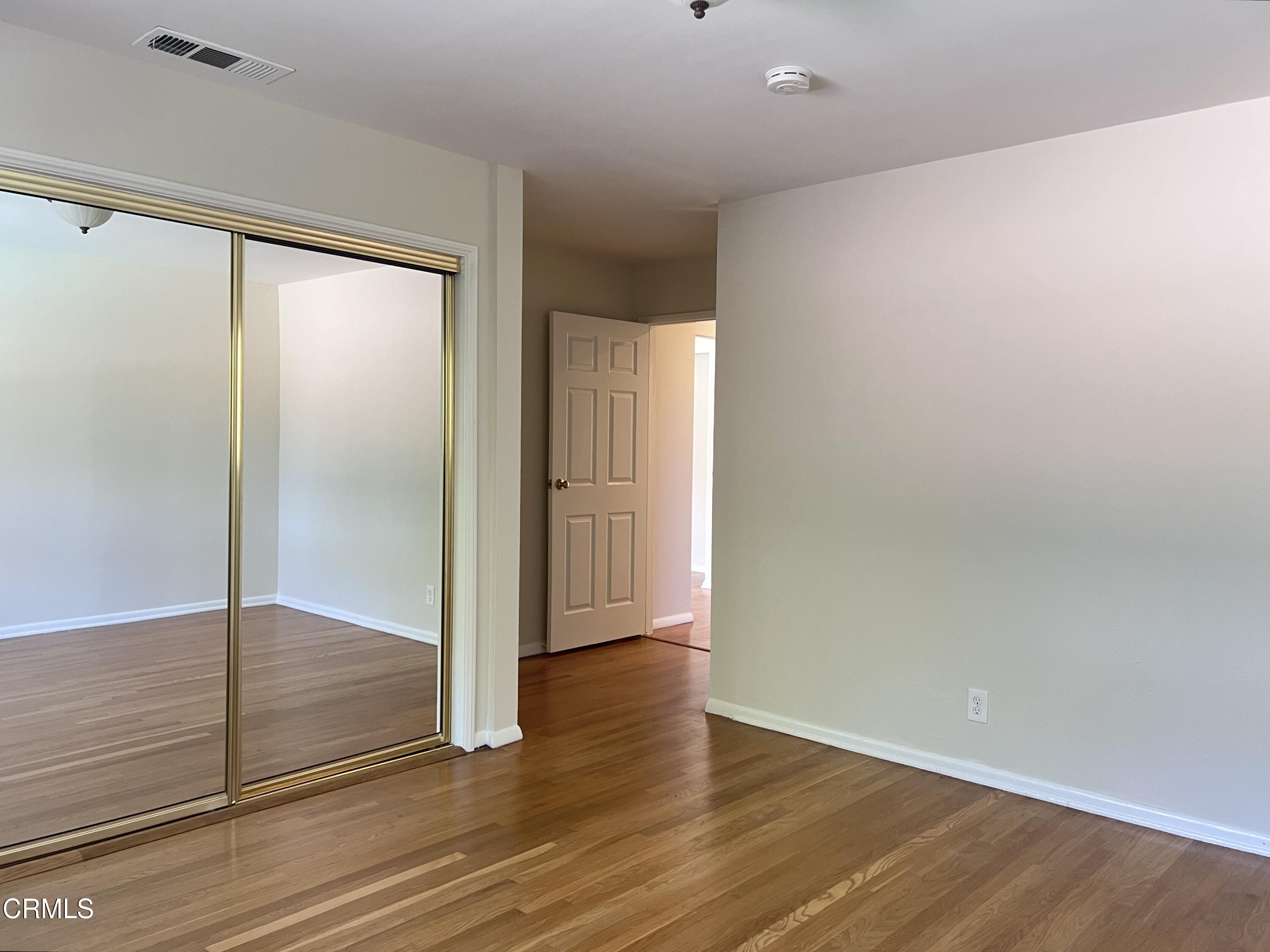 3159 Piccolo Street Pasadena, CA 91107 - Photo 10 of 14 wooden floor in an empty room