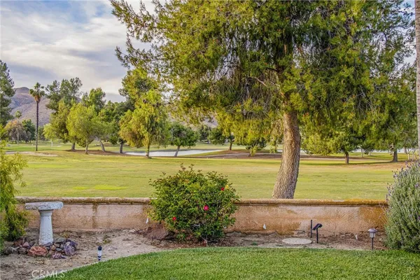 a view of a lake with a yard